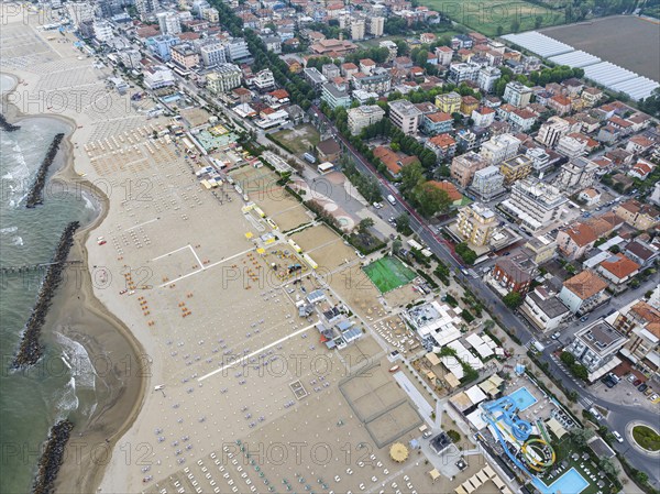 Bathing beach in Rimini. Bathing beach on the Adriatic in bad weather. All deckchairs are free.