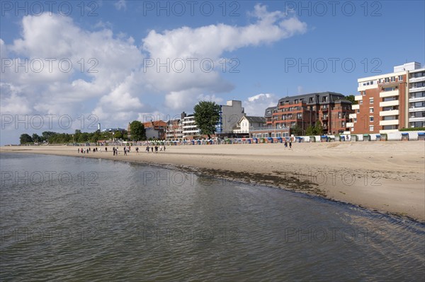 People doing early morning sports on the beach, North Sea coast, Wyk, Föhr, North Sea island, North
