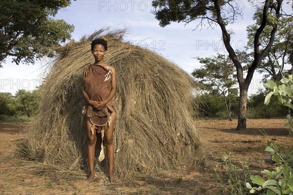 Bushman woman in front of her hut, San, Namibia, Africa