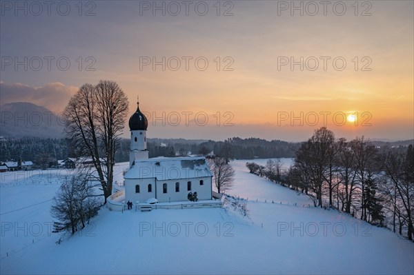 Sunset, Church of the Visitation of the Virgin Mary in winter, Oberbuchen, drone shot, Tölzer Land,