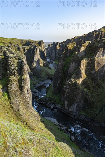 Fjaðrárgljúfur Canyon, Fjadrargljufur, rock formations in rugged deep canyon with river in the