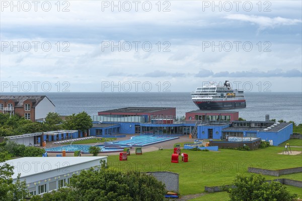 Seawater swimming pool on the offshore island of Heligoland, beach chairs, passenger ship Maud,