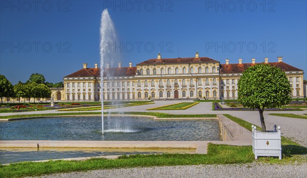 Garden parterre with fountain in front of the New Palace in the Schleissheim Palace complex,