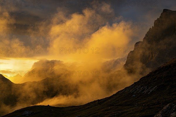 Montafon mountains with dramatic cloudy sky at sunset, Tschagguns, Rätikon, Montafon, Vorarlberg,