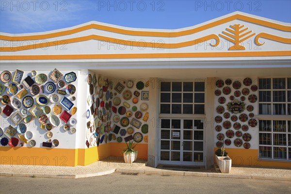 Ceramic trader, decoration facade, near Sagres, Algarve, Portugal, shop decoration of a ceramic