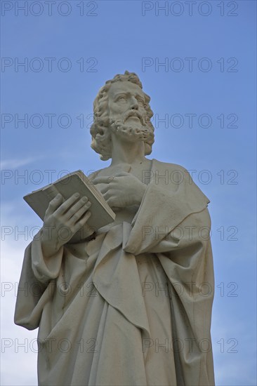 Sculpture of St Mark the Apostle with Bible, Saint, detail, UNESCO St Mary and St Mark's Church,