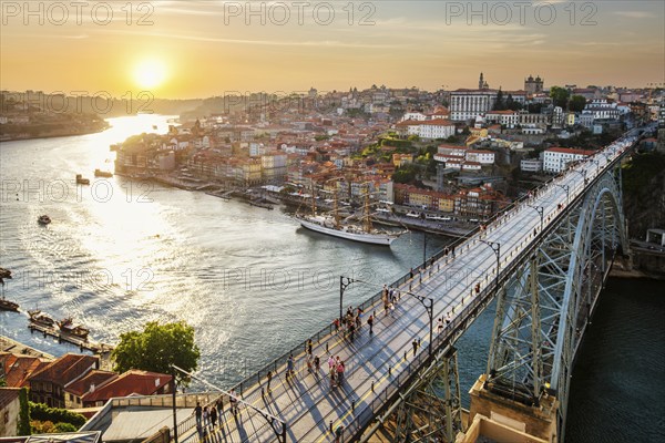 View of Porto city and Douro river and Dom Luis bridge I from famous tourist viewpoint Miradouro da