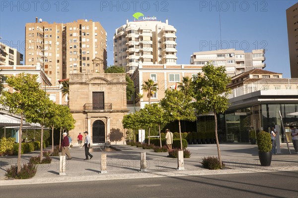 People walking in the newly redeveloped port area of shops and bars Malaga, Spain, Muelle dos,