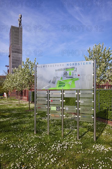 Signpost to the companies in the Nordstern industrial park and the winding tower of Nordstern
