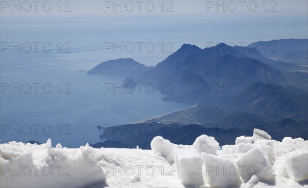 View of the Turkish Riviera from the snow-covered Tahtali Dagi, Turkey, Asia