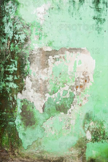 Dilapidated facade of a building, pastel, green, broken, background, texture, wall, detail,