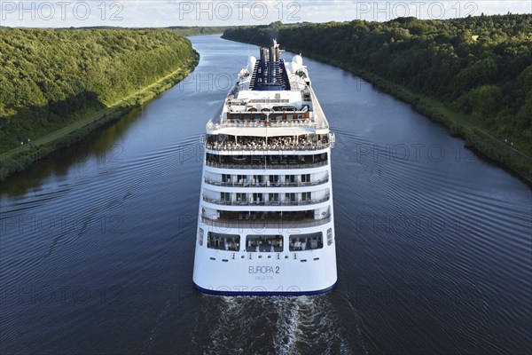 Cruise ship Europa 2 sailing in the evening light in the Kiel Canal, Kiel Canal,