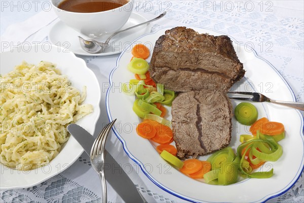Swabian cuisine, roast beef, roast ox, herb spaetzle, meat dish, gravy, carrot vegetables, leek,