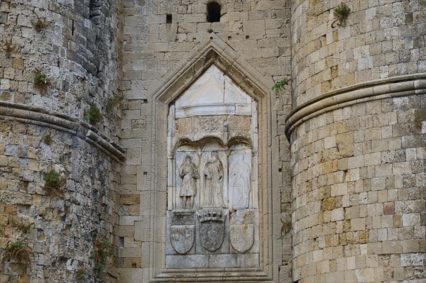 City wall, Thalassini Tor, detailed view of a medieval fortress with stone reliefs and sculptures