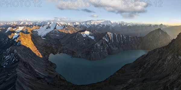 Evening mood, mountain panorama, aerial view, 4000 metre peak with glacier, mountain pass and