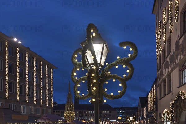 Decorated street lamp at the Christkindlesmarkt, Nuremberg, Middle Franconia, Bavaria, Germany,