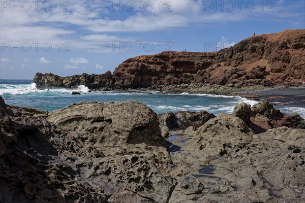Lava rocks at the Playa de los Ciclos near the Green Lake, Lago Verde, El Golfo, Lanzarote, Canary