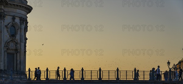 Evening sun, pedestrians on the Karl-Liebknecht-Bridge, Berlin, Germany, Europe