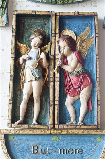 Painted plaster angels in village parish church of Saint Michael, Wilsford cum Lake, Wiltshire,