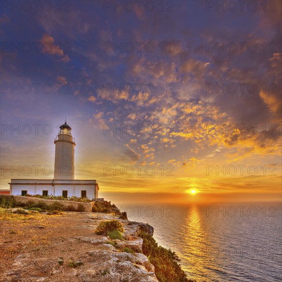 La Mola Cape Lighthouse Formentera at sunrise in Balearic Islands