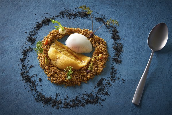 Eel recipe with eggs at low temperature foam and crispy as a round garden