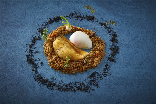 Eel recipe with eggs at low temperature foam and crispy as a round garden