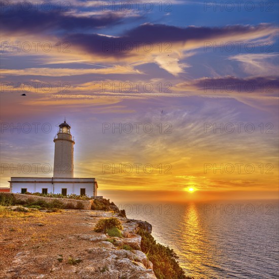 La Mola Cape Lighthouse Formentera at sunrise in Balearic Islands