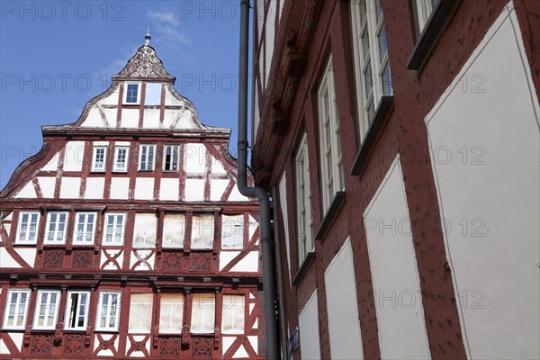 Restored and not yet restored houses, Kornmarkt grain market, historic old town of Herborn, Hesse,