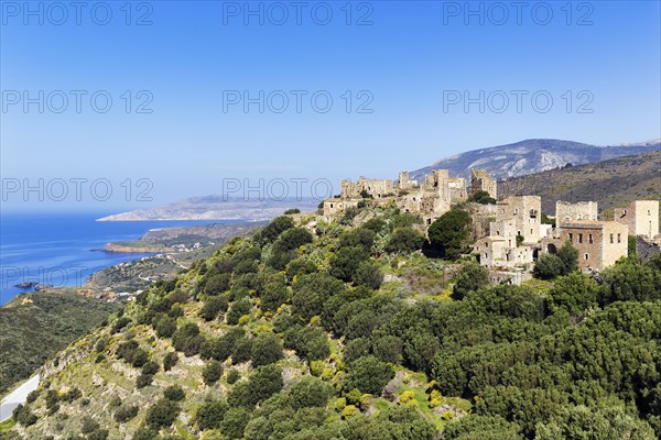 Picturesque residential towers with holiday flats and hotels, historic village of Vathia, view of