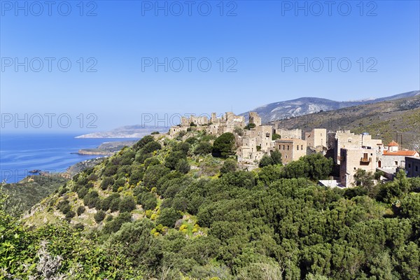 Picturesque residential towers with holiday flats and hotels, historic village of Vathia, view of