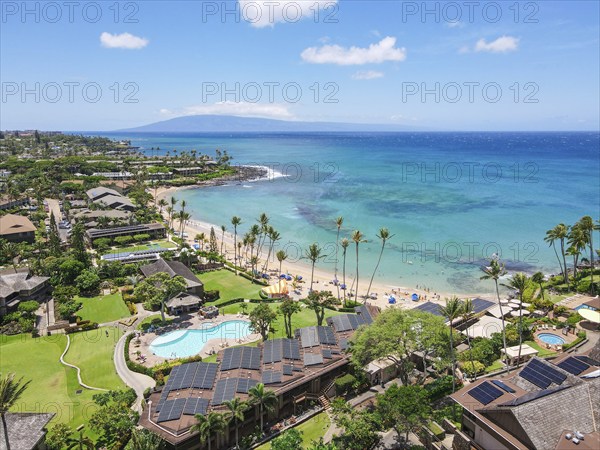 Aerial view of tropical destination with white sand and turquoise water. Kapalua coast in Maui,