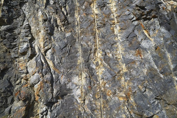 Slate stone detail in pyrenees with drill holes