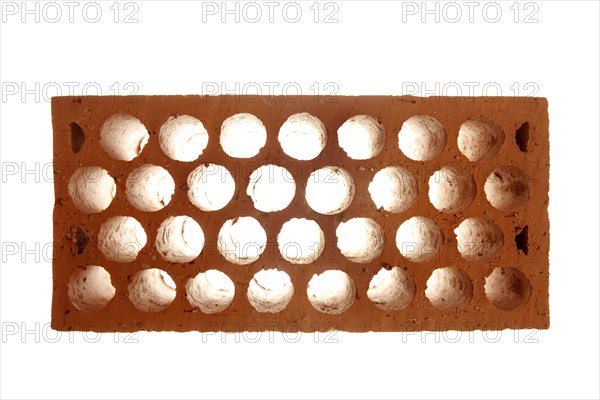 Construction metaphor. Brick with honeycomb texture and back light