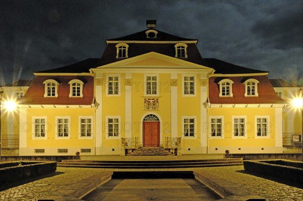 The illuminated Friederikenschlösschen in the evening. Bad Langensalza, Thuringia, Germany, Europe