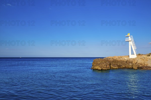 Denia Las Rotas Trampoli beach and tower in Mediterranean Spain Alicante