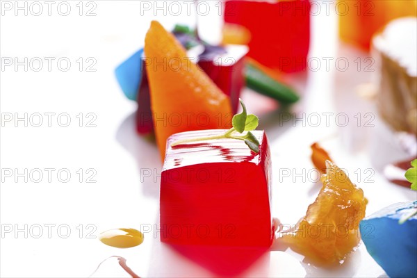 Jelly colorful fruits gelatine on white background