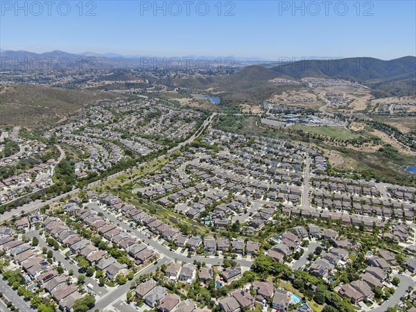 Aerial view of suburban neighborhood with big mansions in San Diego, California, USA. Aerial view