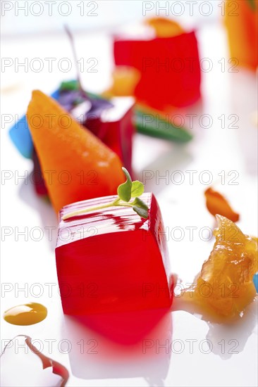 Jelly colorful fruits gelatine on white background