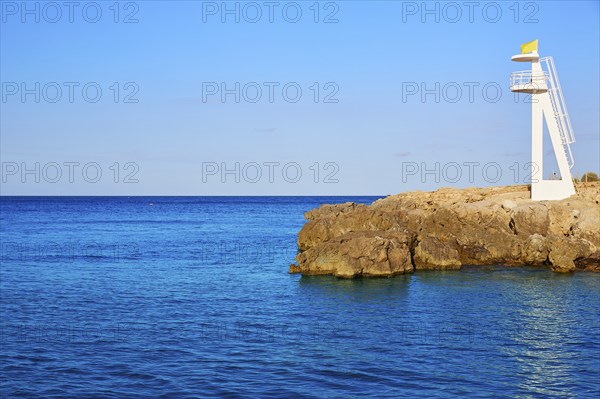 Denia Las Rotas Trampoli beach and tower in Mediterranean Spain Alicante
