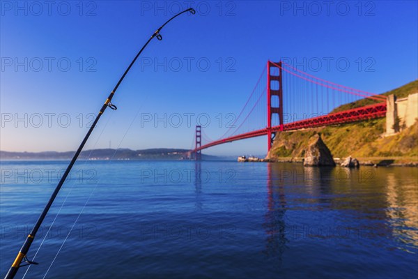 San Francisco Golden Gate Bridge with fishing rod California USA