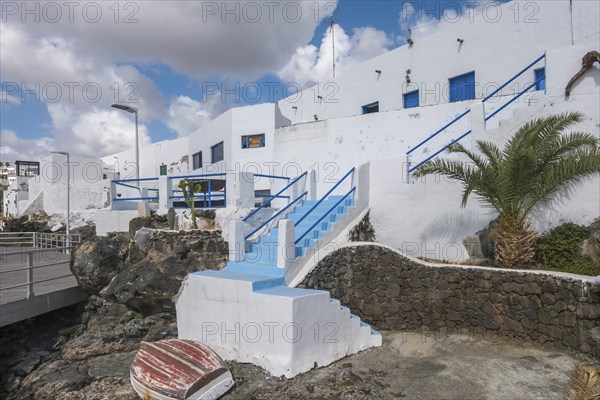 Typical white houses on the promenade of Puerto del Carmen, Lanzarote, Canary Islands, Spain,