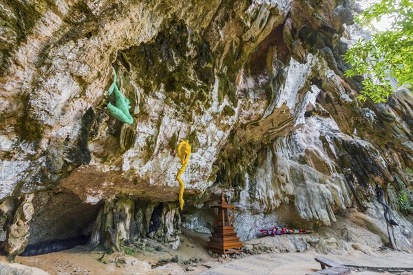 Hiking trail with stuffed animals as sculptures at Phra Nang beach near Krabi, symbol, religion,