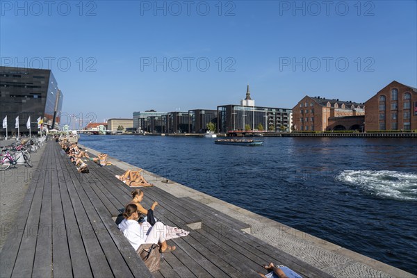 Summer, swimming in the harbour of Copenhagen, there are official bathing places, harbour baths and