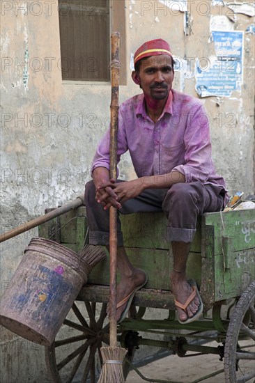 Indian garbage man on wooden cart in Vrindavan, Uttar Pradesh, India, Asia