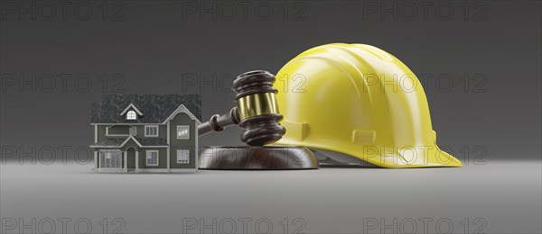 Miniature model house, yellow hard hat and gavel on a gradated background