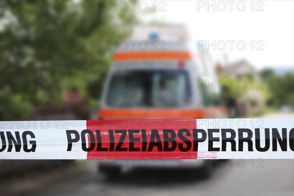 Symbolic image: Police cordon with ambulance in the background
