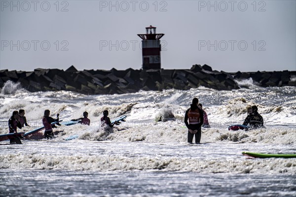 Course for surfers, surfing beginners, on the beach of Scheveningen, Netherlands