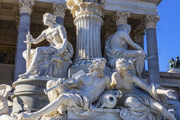 Stone figures of the Pallas-Athena fountain in front of the parliament building, Vienna, Austria,