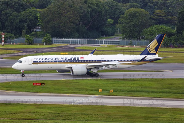 A Singapore Airlines Airbus A350-900 aircraft with the registration 9V-SHG at Changi Airport,