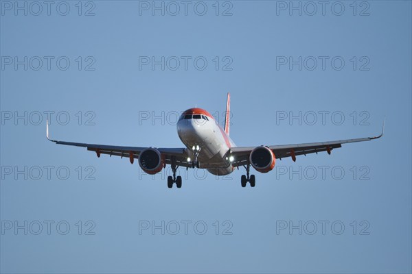 Lisbon, Portugal - September 2, 2023: easyJet Airbus A320-214 passenger plane descends to land in